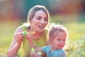 Happy Childhood Ã¢â¬â Family blows soup foam and make bubbles